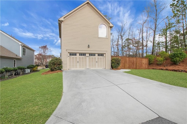1803 Stone Bridge Way, Marietta, GA 30064 - view of property exterior with an attached garage, fence, a yard, and driveway