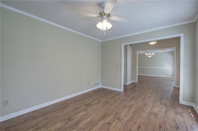 spare room featuring a textured ceiling, ceiling fan with notable chandelier, wood-type flooring, and crown molding