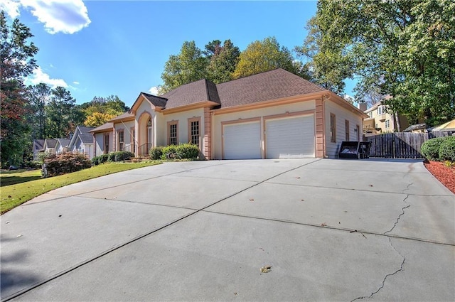 view of front of property with a garage