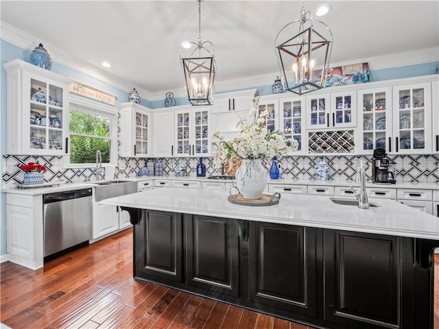 7060 Summit Rdg, Chase, Cumming, GA 30041 - kitchen featuring stainless steel dishwasher, a sink, a chandelier, light countertops, and ornamental molding