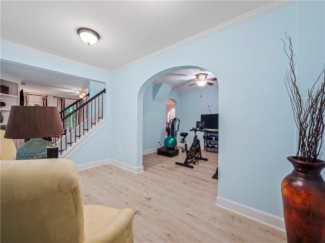 7060 Summit Rdg, Chase, Cumming, GA 30041 - living area featuring baseboards, crown molding, arched walkways, wood finished floors, and an office area