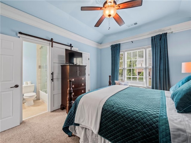 7060 Summit Rdg, Chase, Cumming, GA 30041 - carpeted bedroom with a barn door, ensuite bath, ceiling fan, lofted ceiling, and ornamental molding