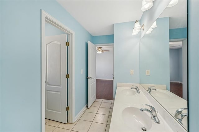 2143 Great Shoals Cir, Lawrenceville, GA 30045 - full bath with double vanity, a sink, and tile patterned floors