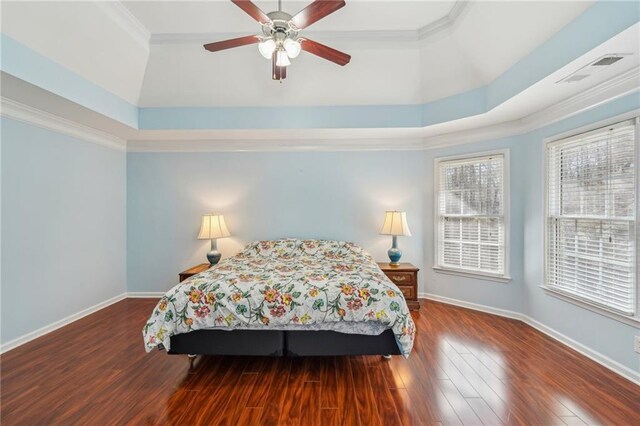 2143 Great Shoals Cir, Lawrenceville, GA 30045 - bedroom with a tray ceiling, ornamental molding, a ceiling fan, wood finished floors, and baseboards