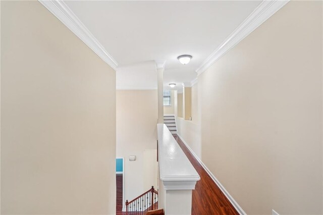 2143 Great Shoals Cir, Lawrenceville, GA 30045 - corridor featuring dark wood-style floors, baseboards, stairway, and ornamental molding