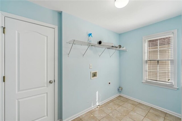 2143 Great Shoals Cir, Lawrenceville, GA 30045 - clothes washing area with light tile patterned flooring, hookup for a washing machine, laundry area, baseboards, and electric dryer hookup