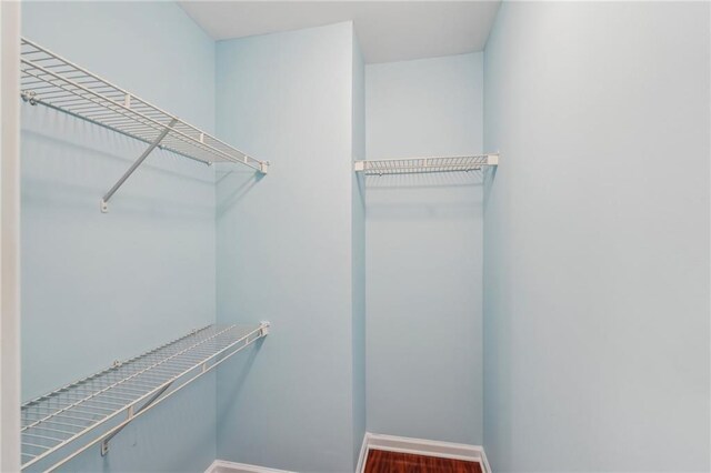 2143 Great Shoals Cir, Lawrenceville, GA 30045 - spacious closet with wood finished floors