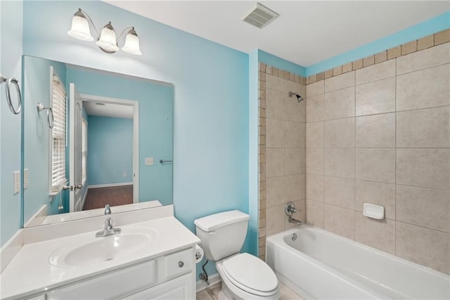 2143 Great Shoals Cir, Lawrenceville, GA 30045 - full bath featuring shower / bath combination, visible vents, toilet, vanity, and baseboards