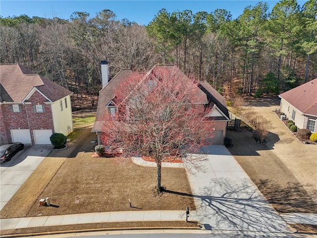 2143 Great Shoals Cir, Lawrenceville, GA 30045 - birds eye view of property featuring a view of trees