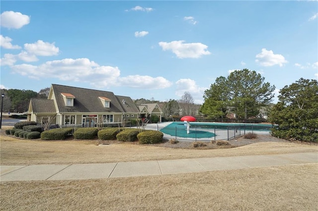 2143 Great Shoals Cir, Lawrenceville, GA 30045 - view of property's community featuring a lawn and a pool