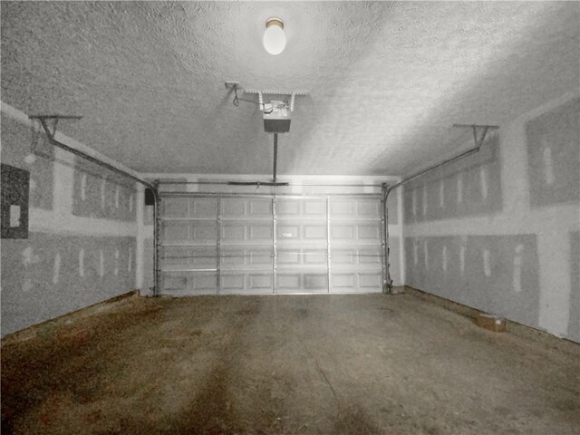 carpeted empty room with a textured ceiling and ceiling fan