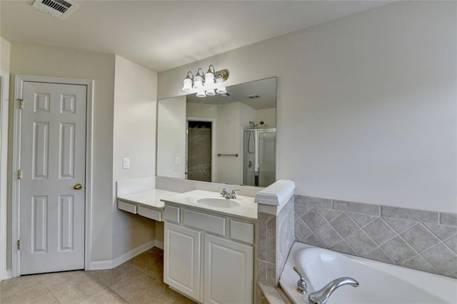 bathroom with visible vents, tile patterned floors, a garden tub, vanity, and a shower stall