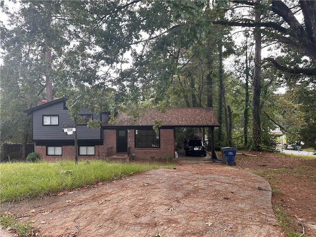 view of front of house featuring a carport