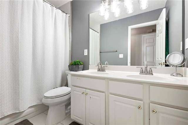 bathroom featuring double vanity, a sink, toilet, and shower / tub combo with curtain