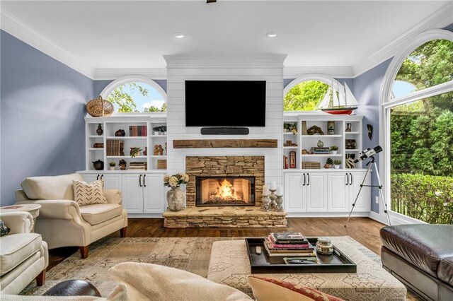 4020 Devereux Chase, Roswell, GA 30075 - living area with crown molding, wood finished floors, and a fireplace