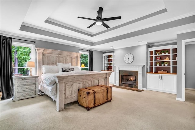 4020 Devereux Chase, Roswell, GA 30075 - bedroom with crown molding, a raised ceiling, multiple windows, light colored carpet, and a fireplace with flush hearth