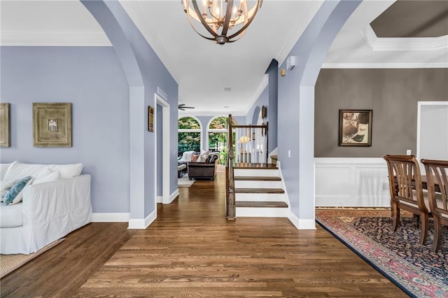 4020 Devereux Chase, Roswell, GA 30075 - foyer with arched walkways, wood finished floors, ornamental molding, a chandelier, and baseboards
