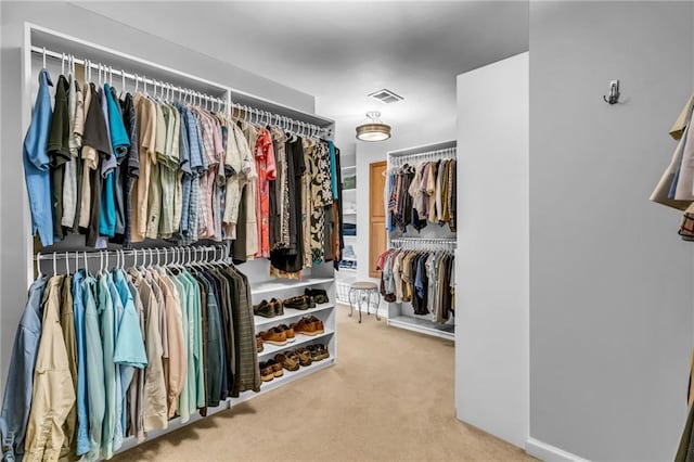 4020 Devereux Chase, Roswell, GA 30075 - walk in closet featuring carpet floors
