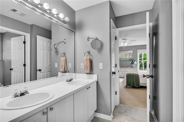 4020 Devereux Chase, Roswell, GA 30075 - ensuite bathroom with ceiling fan, double vanity, and baseboards
