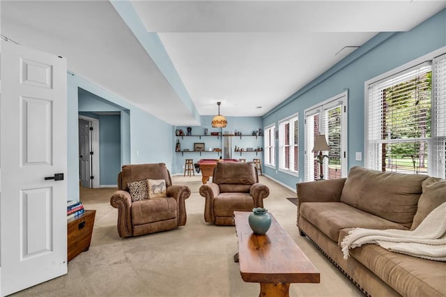 4020 Devereux Chase, Roswell, GA 30075 - carpeted living area with plenty of natural light, a bar, and baseboards