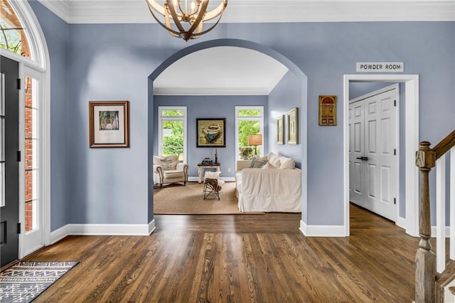 4020 Devereux Chase, Roswell, GA 30075 - foyer entrance with arched walkways, baseboards, a chandelier, ornamental molding, and wood finished floors