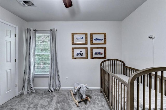 6520 Fairfield Trce, Suwanee, GA 30024 - carpeted bedroom featuring a nursery area and a ceiling fan