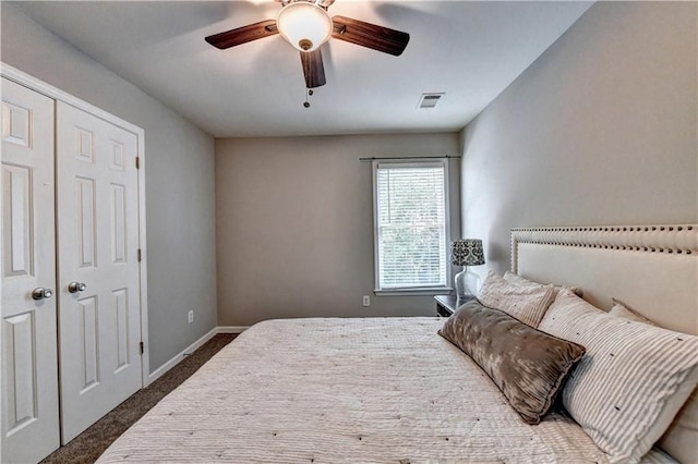 6520 Fairfield Trce, Suwanee, GA 30024 - bedroom with carpet flooring, ceiling fan, and a closet