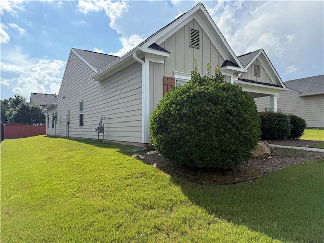2979 Dungeness Dr, Douglasville, GA 30135 - view of side of home featuring board and batten siding and a garage