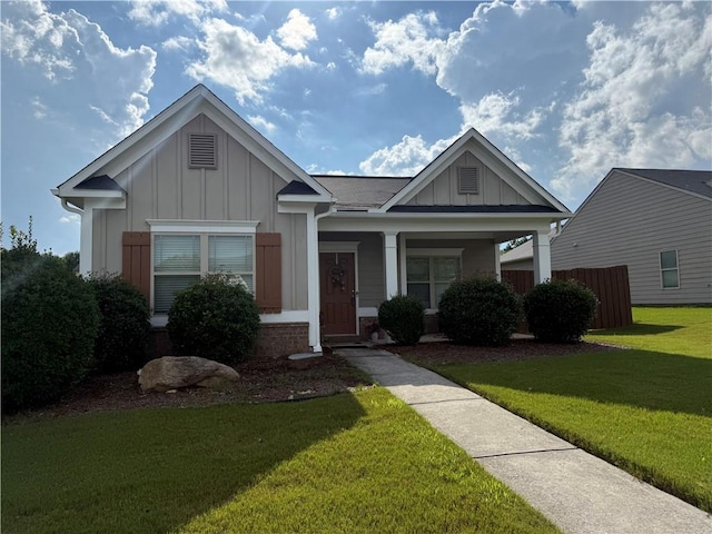 2979 Dungeness Dr, Douglasville, GA 30135 - view of front of house with board and batten siding and a front lawn