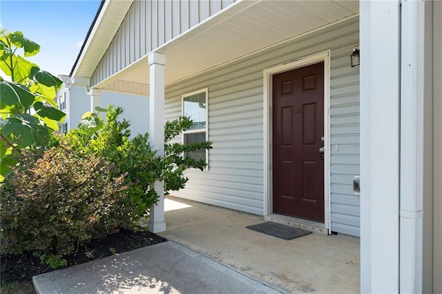 290 Middleton Ct, Chatsworth, GA 30705 - doorway to property featuring a porch and board and batten siding