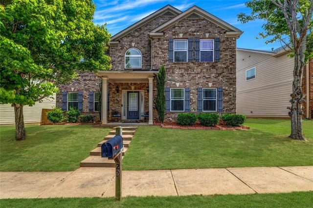 29 Madrid Ave, Newnan, GA 30263 - traditional-style house with brick siding and a front lawn