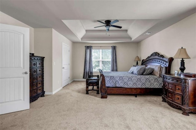 29 Madrid Ave, Newnan, GA 30263 - bedroom featuring light carpet, a tray ceiling, ceiling fan, and baseboards