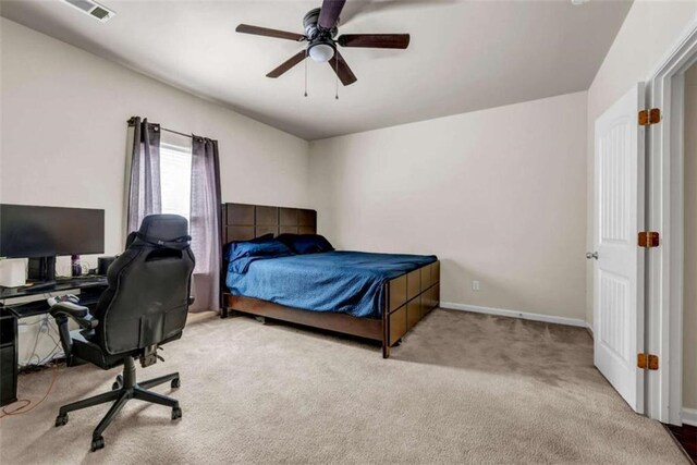 29 Madrid Ave, Newnan, GA 30263 - carpeted bedroom with baseboards, ceiling fan, and a desk