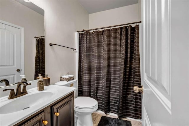 29 Madrid Ave, Newnan, GA 30263 - bathroom featuring toilet, vanity, and a shower with curtain