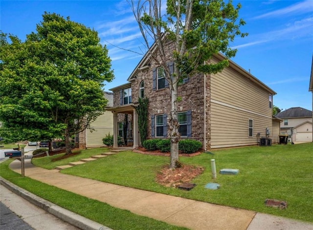 29 Madrid Ave, Newnan, GA 30263 - view of front of property featuring brick siding, a front lawn, and cooling unit