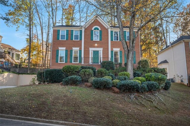 colonial house with a front yard