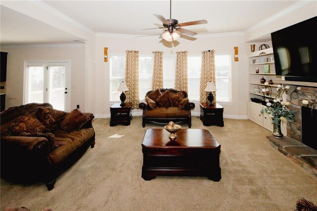 4594 Marching Ln, Fairburn, GA 30213 - living room featuring light carpet, ornamental molding, and a stone fireplace