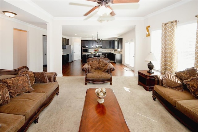 4594 Marching Ln, Fairburn, GA 30213 - living area with ceiling fan, crown molding, and wood finished floors