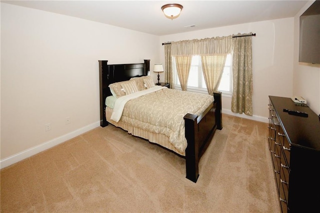 4594 Marching Ln, Fairburn, GA 30213 - bedroom featuring light carpet, visible vents, and baseboards
