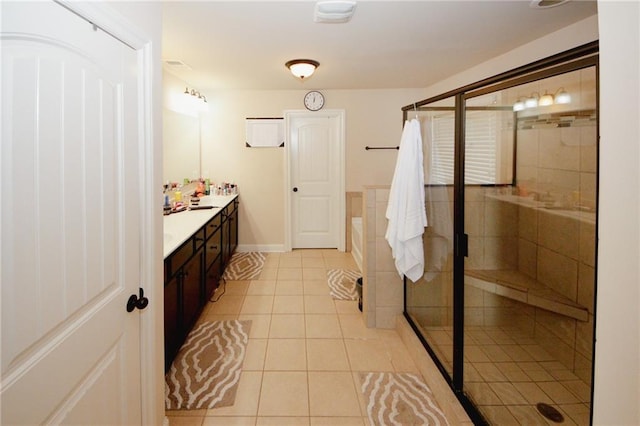 4594 Marching Ln, Fairburn, GA 30213 - bathroom with a stall shower, tile patterned flooring, a garden tub, and vanity