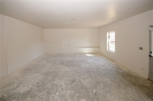 4594 Marching Ln, Fairburn, GA 30213 - spare room with unfinished concrete floors