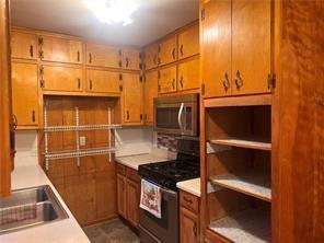 kitchen featuring sink and range