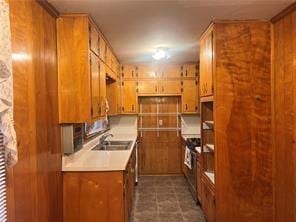 kitchen with sink and range with gas cooktop