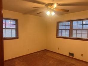 empty room featuring ceiling fan