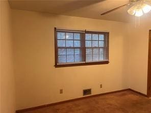 spare room featuring ceiling fan