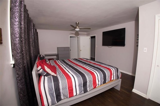 bedroom featuring ceiling fan and dark hardwood / wood-style flooring