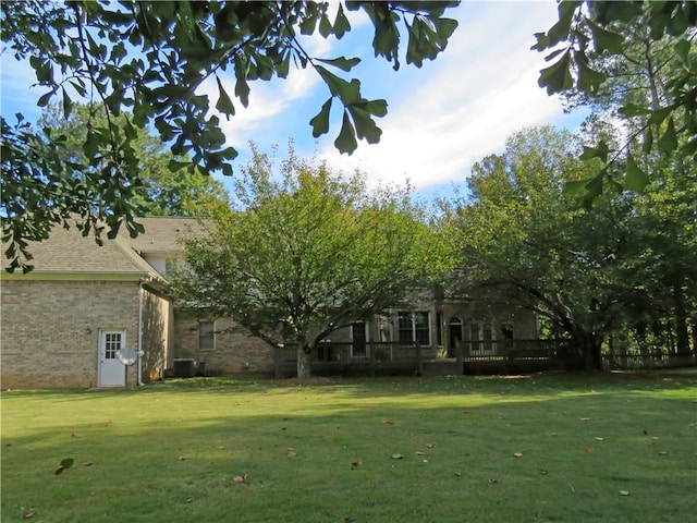 view of yard with central AC unit