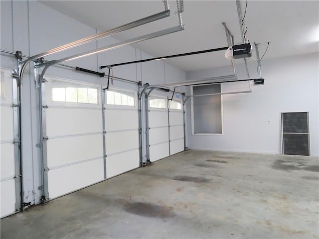 garage featuring a garage door opener