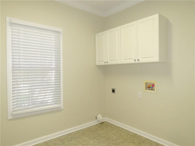 laundry area featuring crown molding, electric dryer hookup, cabinets, and hookup for a washing machine