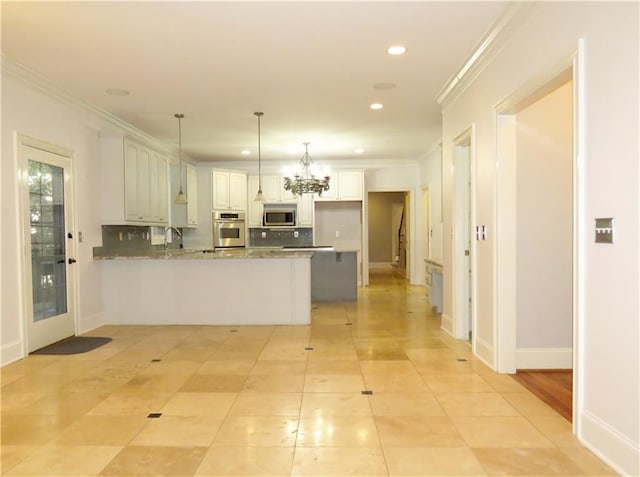 kitchen with hanging light fixtures, kitchen peninsula, stainless steel appliances, white cabinets, and light stone counters